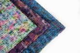 A 3D textured, plaid-patterned embroidery fabric with a plush feel, in a soft pastel palette.
A 3D textured, plaid-patterned embroidery fabric with a plush feel, in a rich palette of purple, burgundy, and orange.
A 3D textured, plaid-patterned embroidery fabric with a plush feel, in a palette of various blues and teals.