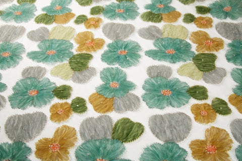 Green, ochre, and grey crinkle ribbon embroidered floral fabric.