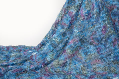 A 3D textured, plaid-patterned embroidery fabric with a plush feel, in a palette of various blues and teals.
