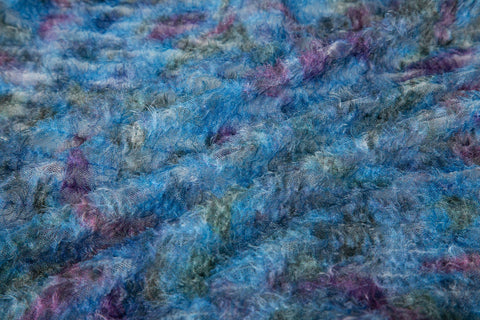 A 3D textured, plaid-patterned embroidery fabric with a plush feel, in a palette of various blues and teals.
