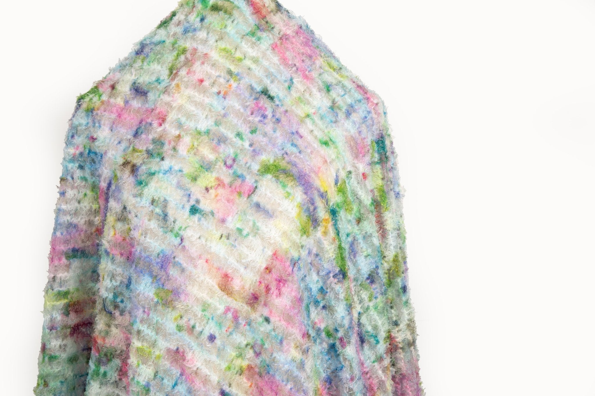 A 3D textured, plaid-patterned embroidery fabric with a plush feel, in a soft pastel palette.
