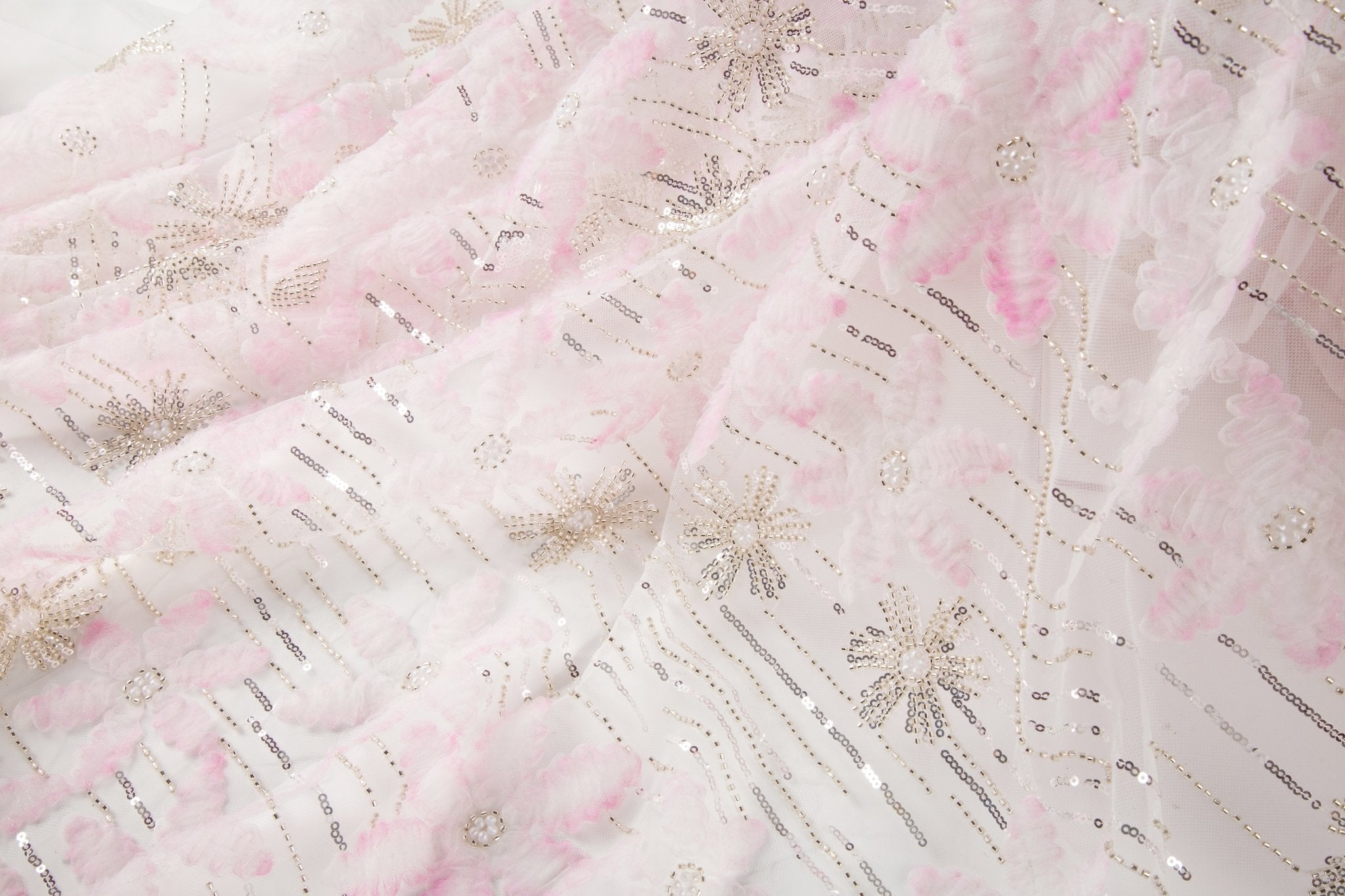 Pink 3D textured floral and silver sequin embroidery fabric