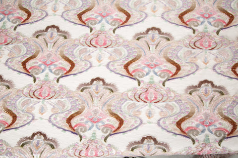 A luxurious sequin embroidery fabric, with a classic damask or brocade pattern in a soft, multi-color pastel palette.
