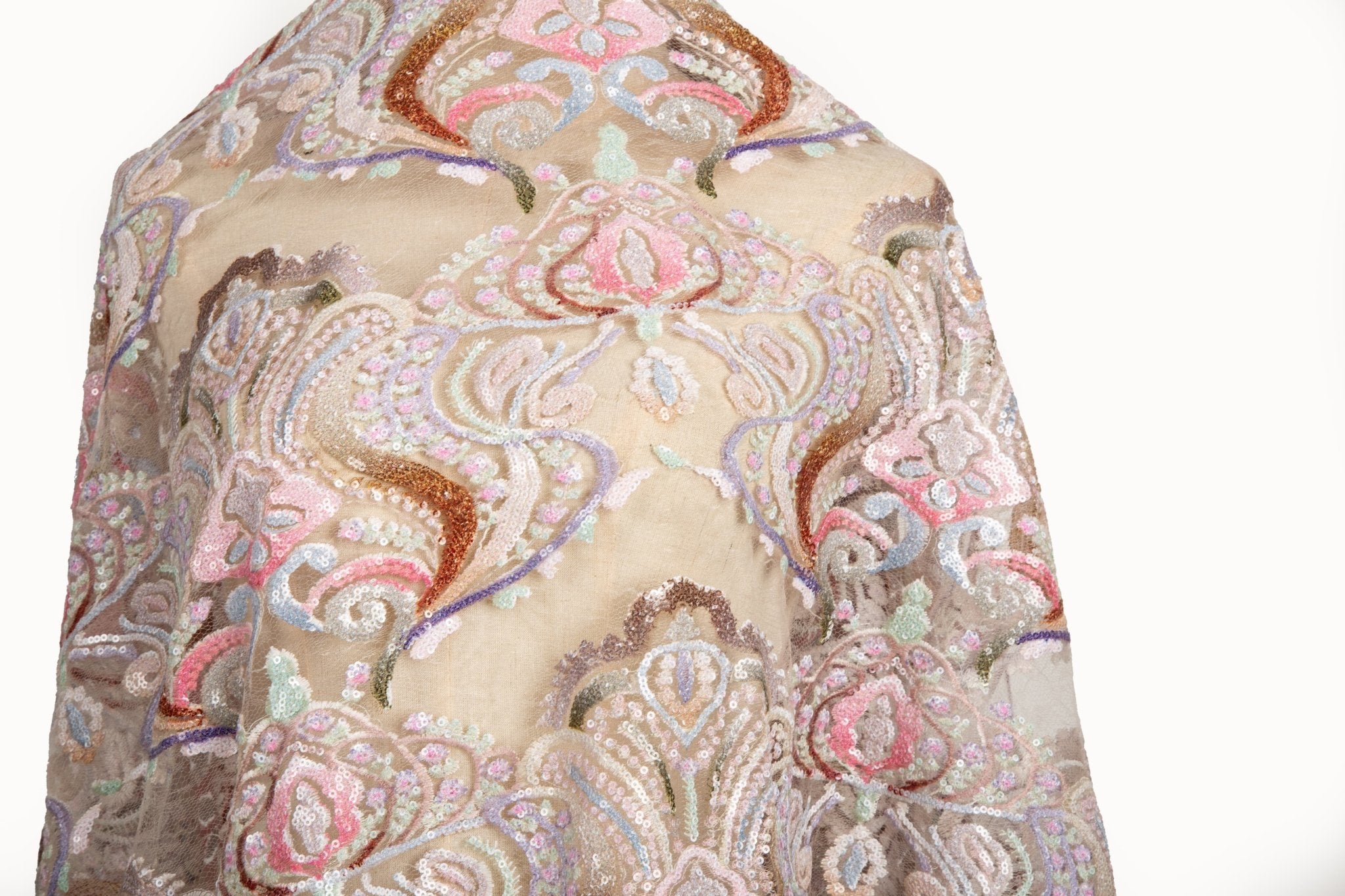 A luxurious sequin embroidery fabric, with a classic damask or brocade pattern in a soft, multi-color pastel palette.
